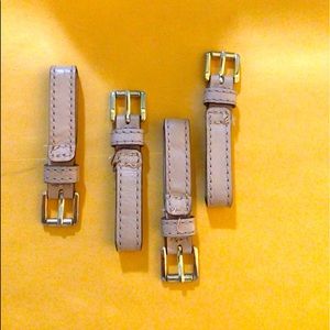 Strap connectors from a Michael Kors shoulder bag